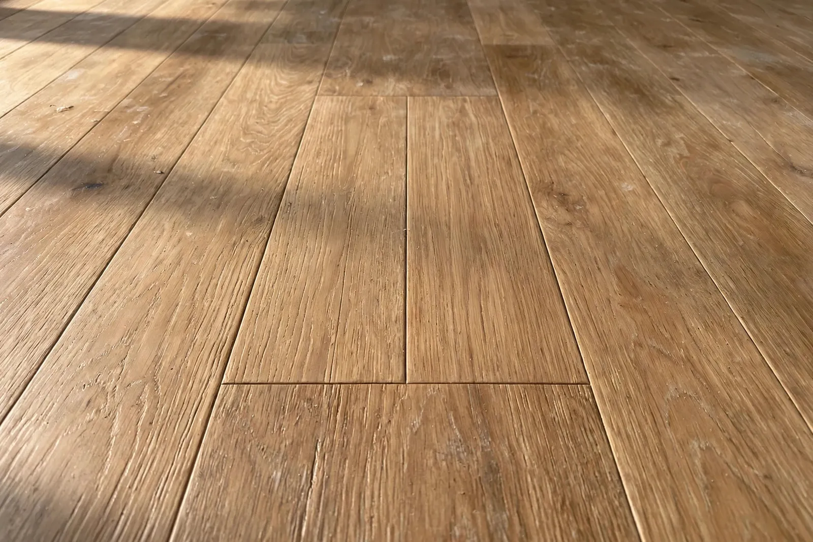 Vinyl Plank Repair — Damaged Plank Section in Pinefield by Waldorf Luxury Vinyl Plank Company